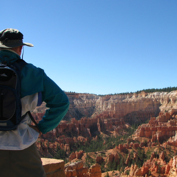 Checking out the surreal view at Bryce Canyon National Park. Learn more about visiting Bryce, Arches & Zion on the blog.