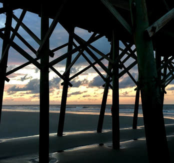 Sunrise View from Under the Folly Beach Pier | 20 Colorful Photos from a Weekend in the Charleston Area