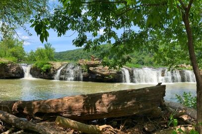 Scenic waterfall views from the Sandstone Falls area at New River Gorge National Park and Preserve.