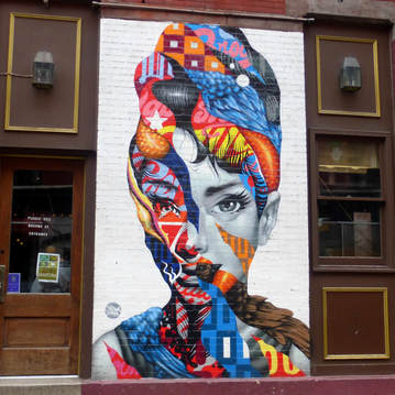 One of my favorite murals that can be found in the Little Italy section of NYC | 5 Cities in the USA with Fascinating Street Art #streetart