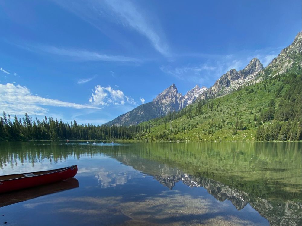 canoe on String Lake Grand Teton and Yellowstone National Parks Road Trip