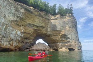 2 people in a kayak at Pictured Rocks National Lakeshore