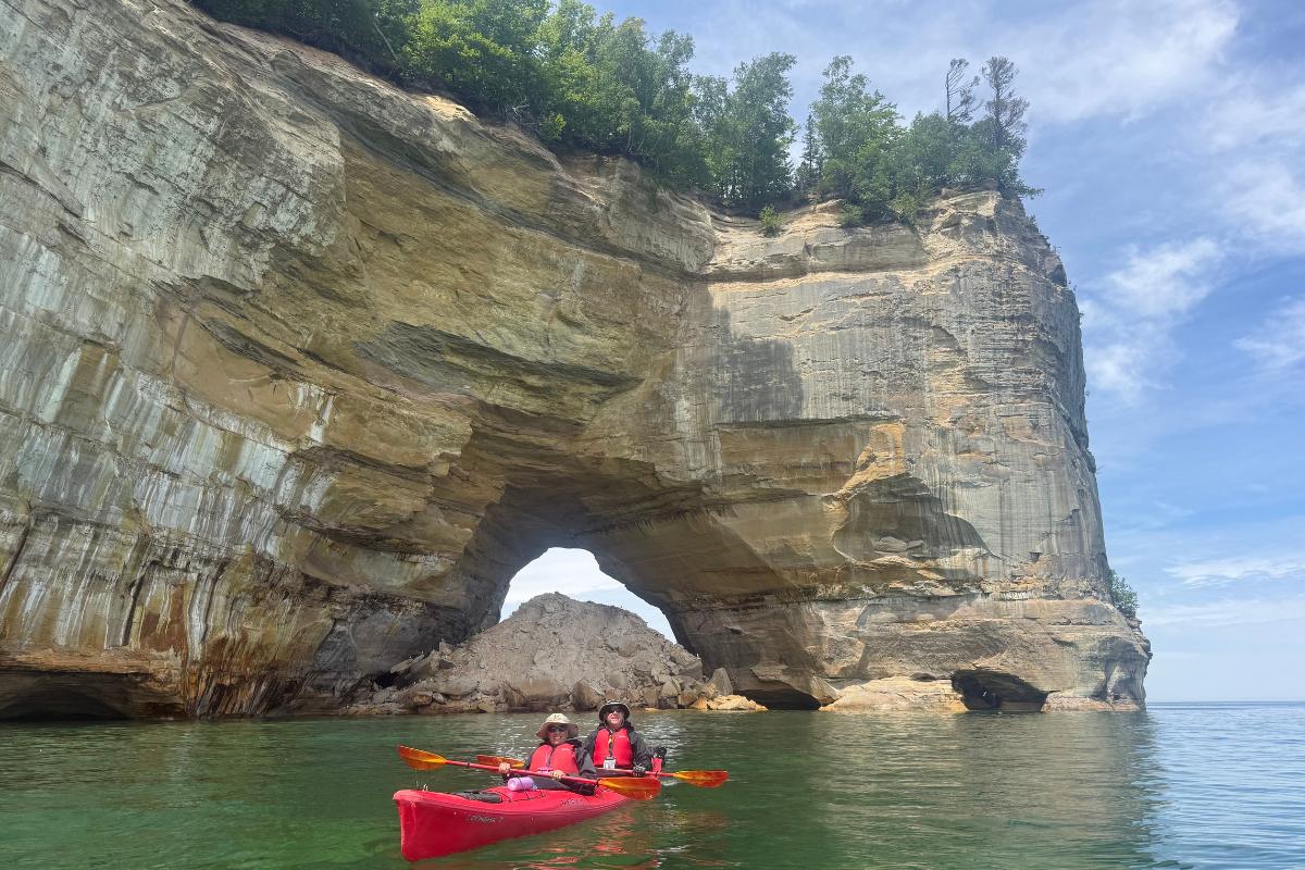 2 people in a kayak at Pictured Rocks National Lakeshore